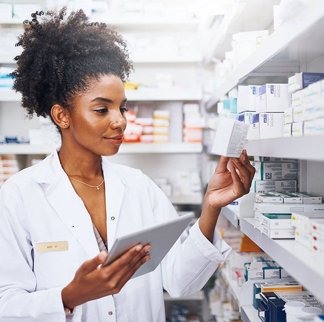 Pharmacist reviewing available products